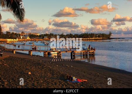 France Reunion island (French overseas department) Etang Sale Etang Sale les Bains seascape small fishing harbor at sunset with Stock Photo