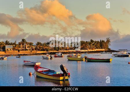 France Reunion island (French overseas department) Etang Sale Etang Sale les Bains seascape small fishing harbor at sunset with Stock Photo