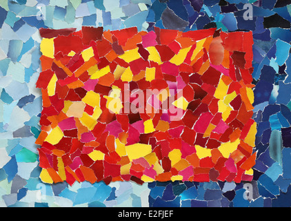 Red and yellow texture made from many pieces of torn paper on blue background Stock Photo