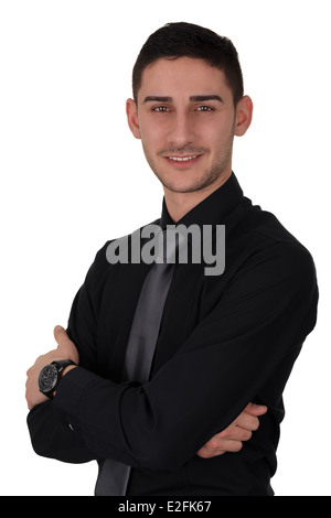 Young Man in Black Shirt and Tie Stock Photo