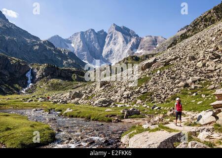 France Hautes Pyrenees Pyrenees National Park GR10 grande randonnee footpath in the Gaube valley north face of the Vignemale Stock Photo