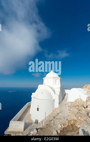 Greece Cyclades Islands Anafi Island the old Kalamiotissa Monastery perched on the tall monolithic rock of Kalamos Stock Photo