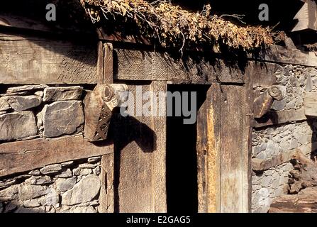 Pakistan Khyber Pakhtunkhwa Kalash valleys Bumburet valley Brun village entrance door to the goddess Jestak's sanctuary Stock Photo