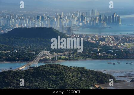 Panama Panama City waterfront skyscrapers and Bridge of Americas (Puente de las Americas) on access channel of Panama Canal in foreground (aerial view) Stock Photo