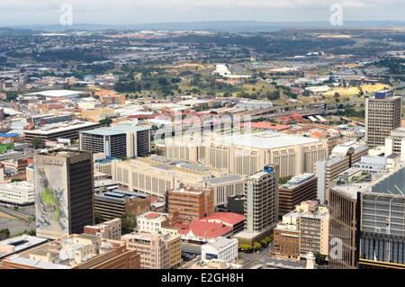 South Africa Gauteng province Johannesburg CBD (Central Business District) downtown view Carlton Center tower Standard Bank headquarters and Soccer City Stadium in Soweto in background Stock Photo
