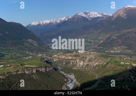 France Hautes Alpes view on Guillestre village on left bank and Mont Dauphin castle on right bank with Guil Valley on foreground and Durance Valley in background Stock Photo