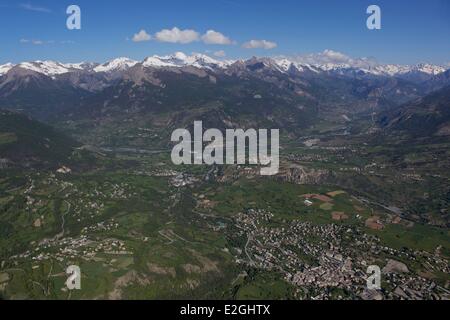 France Hautes Alpes view on Guillestre village and Mont Dauphin castle on right bank with Guil Valley on foreground and Durance Valley in background (aerial view) Stock Photo
