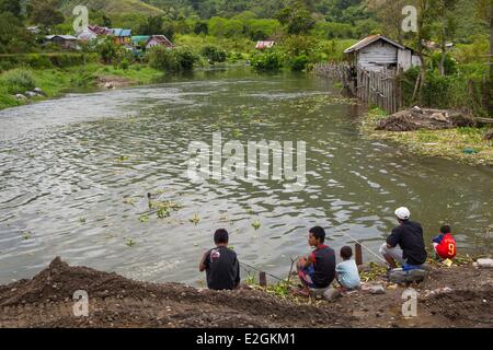 Indonesia Sumatra Island Aceh province Takengon People fishing in a river Stock Photo