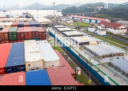 Panama Panama Canal Miraflores locks with an elevation of 16.5 meters and completed in 1913 boat CGM CGM Alcazar built in 2007 and with a capacity of about 5000 containers carrying crossing channel in ten hours crossing boat tanker Athina Stock Photo