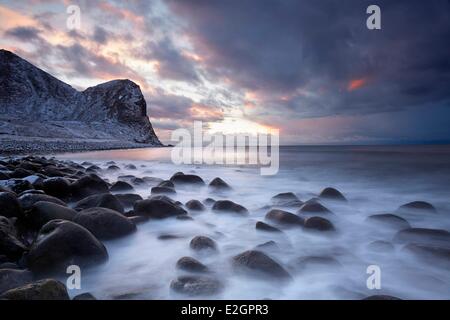 Norway Lofoten islands Vestvagoya sunrise on Unstad beach in winter Stock Photo