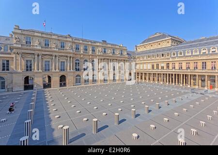 France Paris Palais Royal Daniel Buren's columns with State Council Constitutional Council and French Comedy in background Stock Photo
