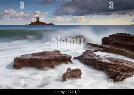 France Var Corniche de l'Esterel Saint Raphael rocks of landing beach of Dramont in front of Ile d'Or Stock Photo