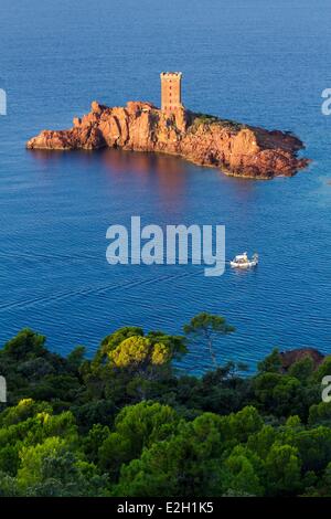 France Var Corniche de l'Esterel Saint Raphael fishing boat in front of Ile d'Or Stock Photo