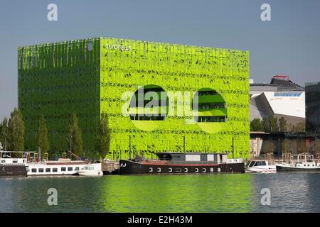 France Rhone Lyon La Confluence new district in South of Presqu'ile (Peninsula) green building of Euronews headquarters by architects Dominique Jakob and Brendan Mac Farlane on old site of Port Rambaud Stock Photo