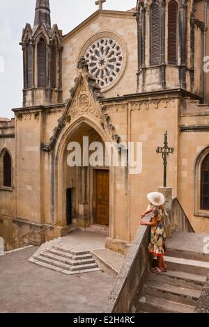 France Gard Sommieres woman to church of Saint Pons Stock Photo