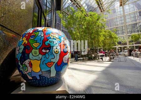 United States New York City Manhattan A Day In Big Apple sculpture by Billy in atrium of IBM Building Stock Photo