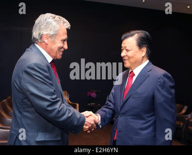 Lisbon, Portugal. 18th June, 2014. Liu Yunshan (R), a member of the Standing Committee of the Political Bureau of the Central Committee of the Communist Party of China, meets with Jeronimo de Sousa, general secretary of the Portuguese Communist Party (PCP), in Lisbon, Portugal, June 18, 2014. © Yao Dawei/Xinhua/Alamy Live News Stock Photo