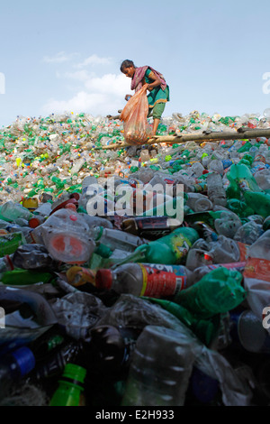 women worker in a plastic bottle recycling factory.,adult,amount,Asia,Bangladesh,Bengal,commerce,conditions,daily life banglades Stock Photo