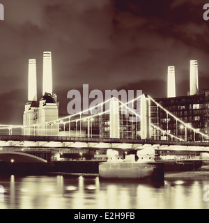 Battersea Power Station over Thames river as the famous London landmark at night. Stock Photo