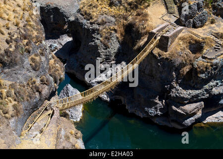 Qu'eswachaka suspension bridge, rope bridge made of woven Peruvian Feathergrass (Stipa ichu), over the Apurimac River, last