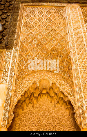 Detail of the intricately carved plasterwork at the Ben Youssef Medersa in Marrakesh, Morocco, North Africa. Stock Photo