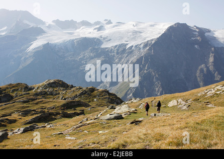 Hiking on the plateau de Emparis, Massif de l'Oisans, near the natural park of les Ecrins, Isère, Rhône-Alpes, France. Stock Photo