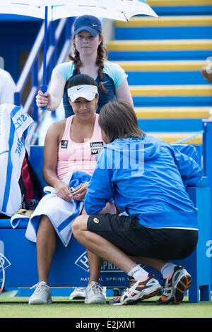 Eastbourne, UK. 20th June, 2014. Heather Watson of Great Britain consults her coach during her Semi-Finals singles match on Day Five of the Aegon International at Devonshire Park, Eastbourne. Credit:  MeonStock/Alamy Live News Stock Photo