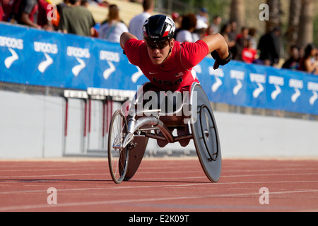 Competitor in a   wheelchair race on the track at the Mt Sac relays in Walnut, California. Stock Photo