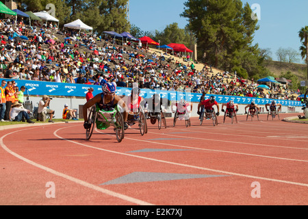Competitors line up at the start  of  a   wheelchair race on the track at the Mt Sac relays in Walnut, California. Stock Photo