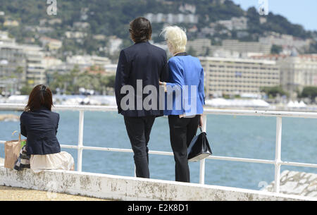 Katja Eichinger and her new boyfriend Anthony James walking along the harbour in Cannes during the 66th Film Festival.  Where: Cannes, France When: 17 May 2013 Stock Photo