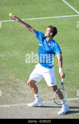 Eastbourne, UK, 20th June, 2014. Feliciano Lopez of Spain serves against Sam Querrey of the USA in their singles match on Day Five of the Aegon International at Devonshire Park, Eastbourne. Credit:  MeonStock/Alamy Live News Stock Photo