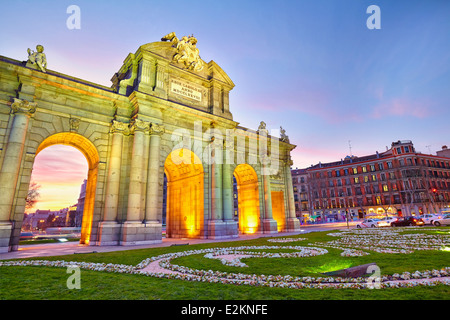 'Puerta de Alcalá' monument by sunset. Madrid, Spain Stock Photo