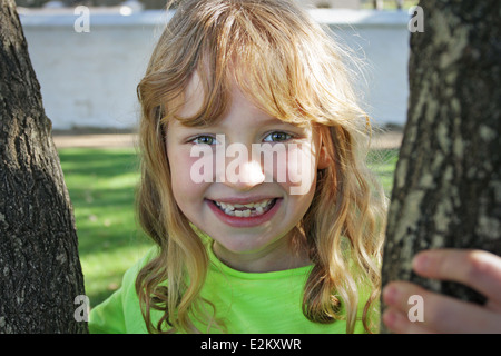 Portrait of a young girl who recently lost front milk teeth Stock Photo