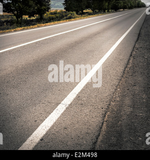 The road stretches into the distance Stock Photo - Alamy