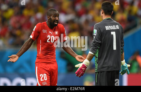 Salvador da Bahia, Brazil. 20th June, 2014.Switzerland's Johan Djouro (L9 talks to goal keeper Diego Benaglio after the 0-4 during the FIFA World Cup 2014 group E preliminary round match between Switzerland and France at the Arena Fonte Nova Stadium in Salvador da Bahia, Brazil, 20 June 2014 Credit:  dpa picture alliance/Alamy Live News Stock Photo
