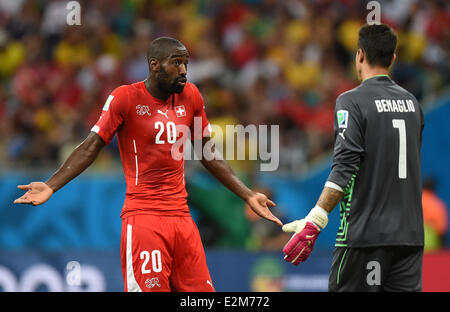 Salvador da Bahia, Brazil. 20th June, 2014.Switzerland's Johan Djouro (L9 talks to goal keeper Diego Benaglio after the 0-4 during the FIFA World Cup 2014 group E preliminary round match between Switzerland and France at the Arena Fonte Nova Stadium in Salvador da Bahia, Brazil, 20 June 2014 Credit:  dpa picture alliance/Alamy Live News Stock Photo