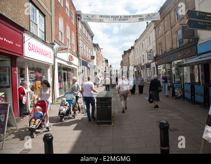 People shopping in the Brittox street, Devizes, England Stock Photo