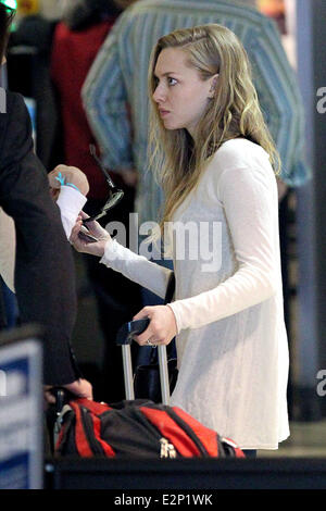 Celebrities arrive at LAX Airport and pass through the security check