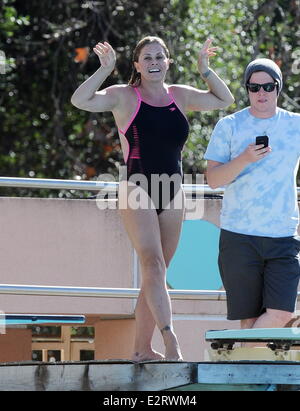 Nicole Eggert sports a one piece swimsuit as she continues to improve ...