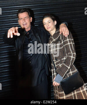 Charlie Sheen poses for the cameras with his girlfriend, Georgia Jones before attending the Slash concert at the Olympia  Featuring: Charlie Sheen,Georgia Jones Where: Dublin, Ireland When: 03 Mar 2013 Stock Photo