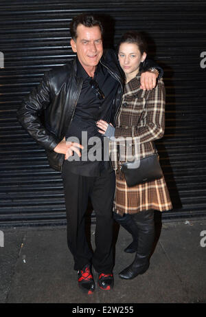 Charlie Sheen poses for the cameras with his girlfriend, Georgia Jones before attending the Slash concert at the Olympia  Featuring: Charlie Sheen,Georgia Jones Where: Dublin, Ireland When: 03 Mar 2013 Stock Photo
