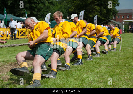 Lincoln, UK. 21st June, 2014. Members of the Lincoln Tug of War Team digging in for the beginning of the first heat in the Men's 700kg class. Lincoln are European Open Club Champions. The winners will be invited to compete in the World Championships in Winconsin, USA. Credit:  David Mark/Alamy Live News Stock Photo