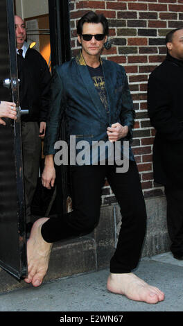 Jim Carrey departs the Ed Sullivan Theater for 'The Late Show with David Letterman' weaing his oversized rubber feet and wings  Featuring: Jim Carrey Where: New York City, New York , United States When: 13 Mar 2013 Stock Photo