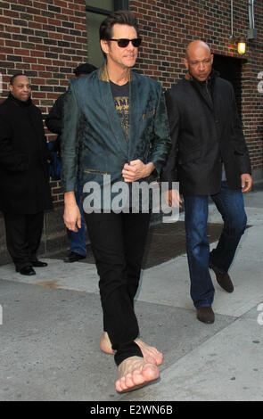 Jim Carrey departs the Ed Sullivan Theater for 'The Late Show with David Letterman' weaing his oversized rubber feet and wings  Featuring: Jim Carrey Where: New York City, New York , United States When: 13 Mar 2013 Stock Photo