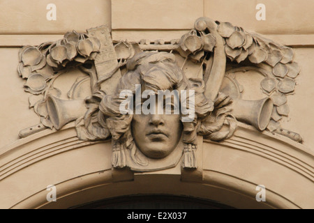 Music. Allegorical mascaron by Czech sculptor Karel Novák on the Municipal House in Prague, Czech Republic. Stock Photo