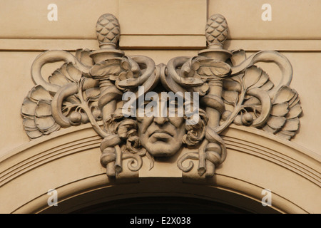 Trade. Allegorical mascaron by Czech sculptor Karel Novák on the Municipal House in Prague, Czech Republic. Stock Photo