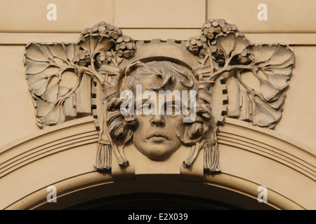 Industry. Allegorical mascaron by Czech sculptor Karel Novák on the Municipal House in Prague, Czech Republic. Stock Photo