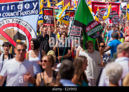 London, June 21st 2014. Flags and banners catch the sun as thousands march against government cuts in London. Credit:  Paul Davey/Alamy Live News Stock Photo