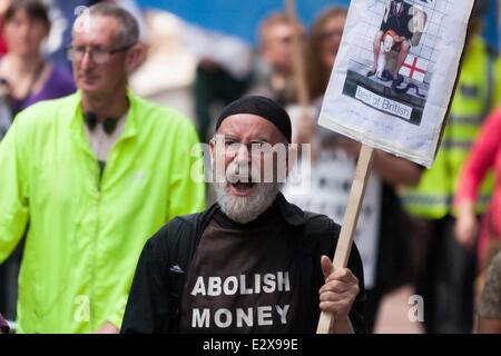 London, June 21st 2014. A protester demands the abolition of money Credit:  Paul Davey/Alamy Live News Stock Photo