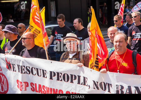 London, June 21st 2014. Members of the Fire Brigades Union participate in the march against austerity. Credit:  Paul Davey/Alamy Live News Stock Photo